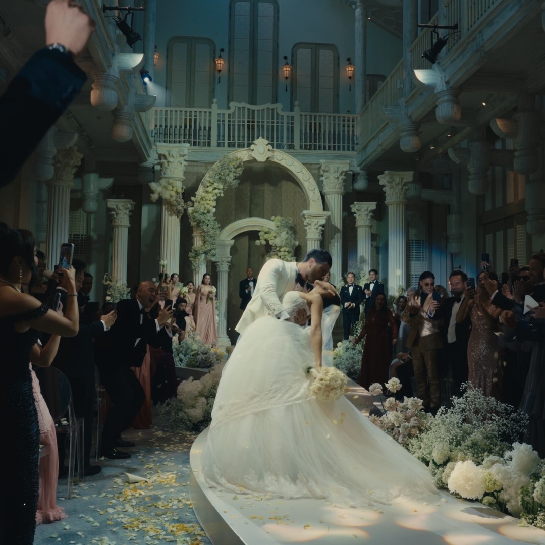 Bride in a flowing gown at a grand destination wedding venue